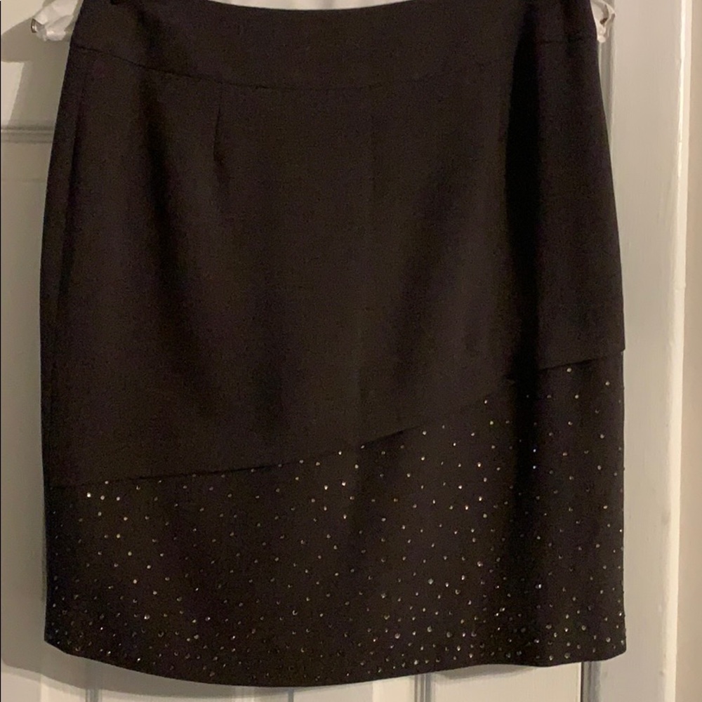 Grey beaded skirt.